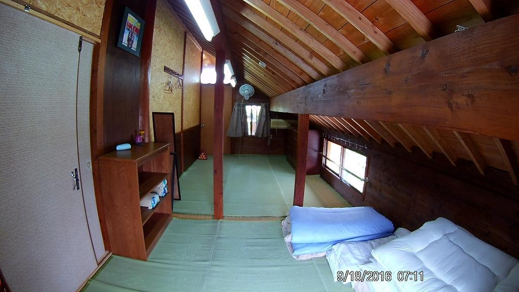 Hotel Tropical Surf House Okinawa à Onna Extérieur photo