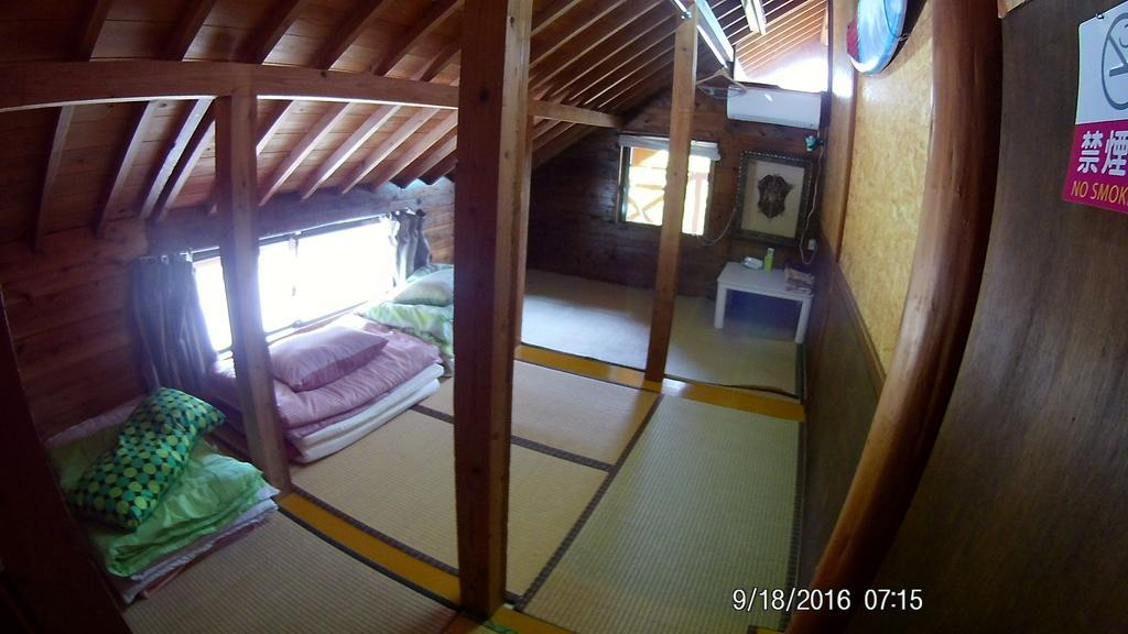 Hotel Tropical Surf House Okinawa à Onna Extérieur photo