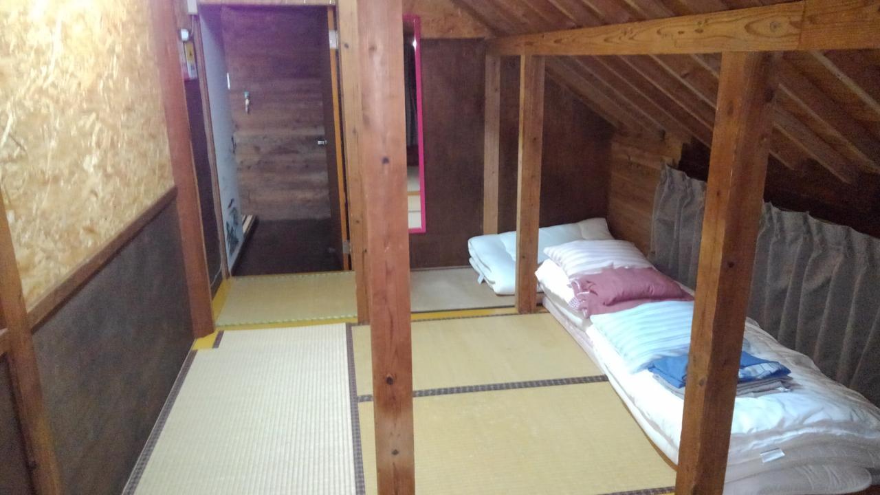 Hotel Tropical Surf House Okinawa à Onna Extérieur photo